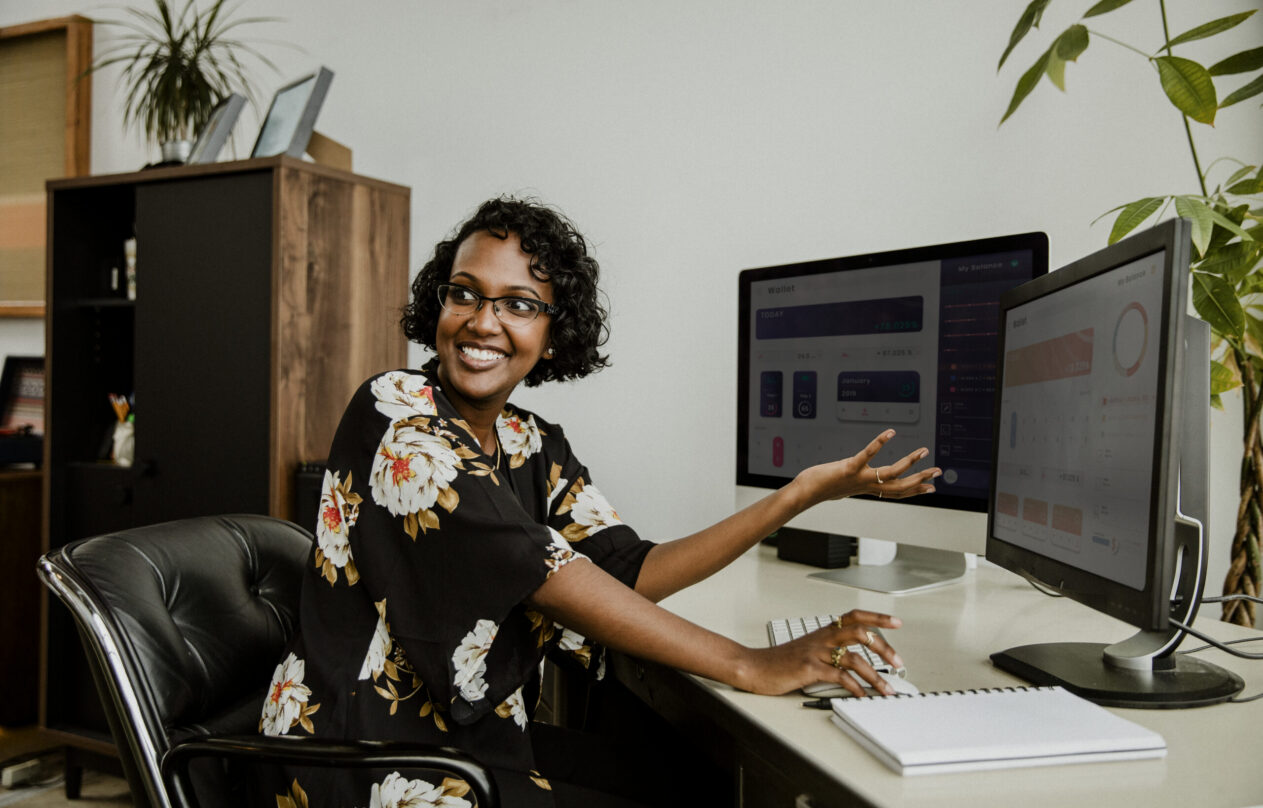 Happy black businesswoman working in the office