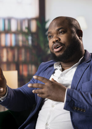 Confident entrepreneur strategize his business over whiskey in a luxury social club, representing diversity and the sophisticated old money fortune. Businessmen negotiating for a collaboration.